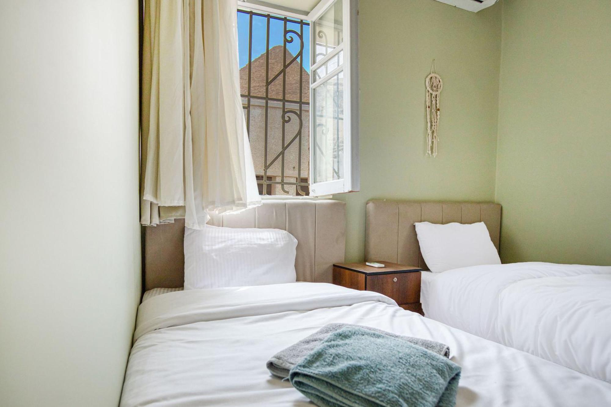 The Grand Pyramids View Hotel Kafret el-Gabal 객실 사진
